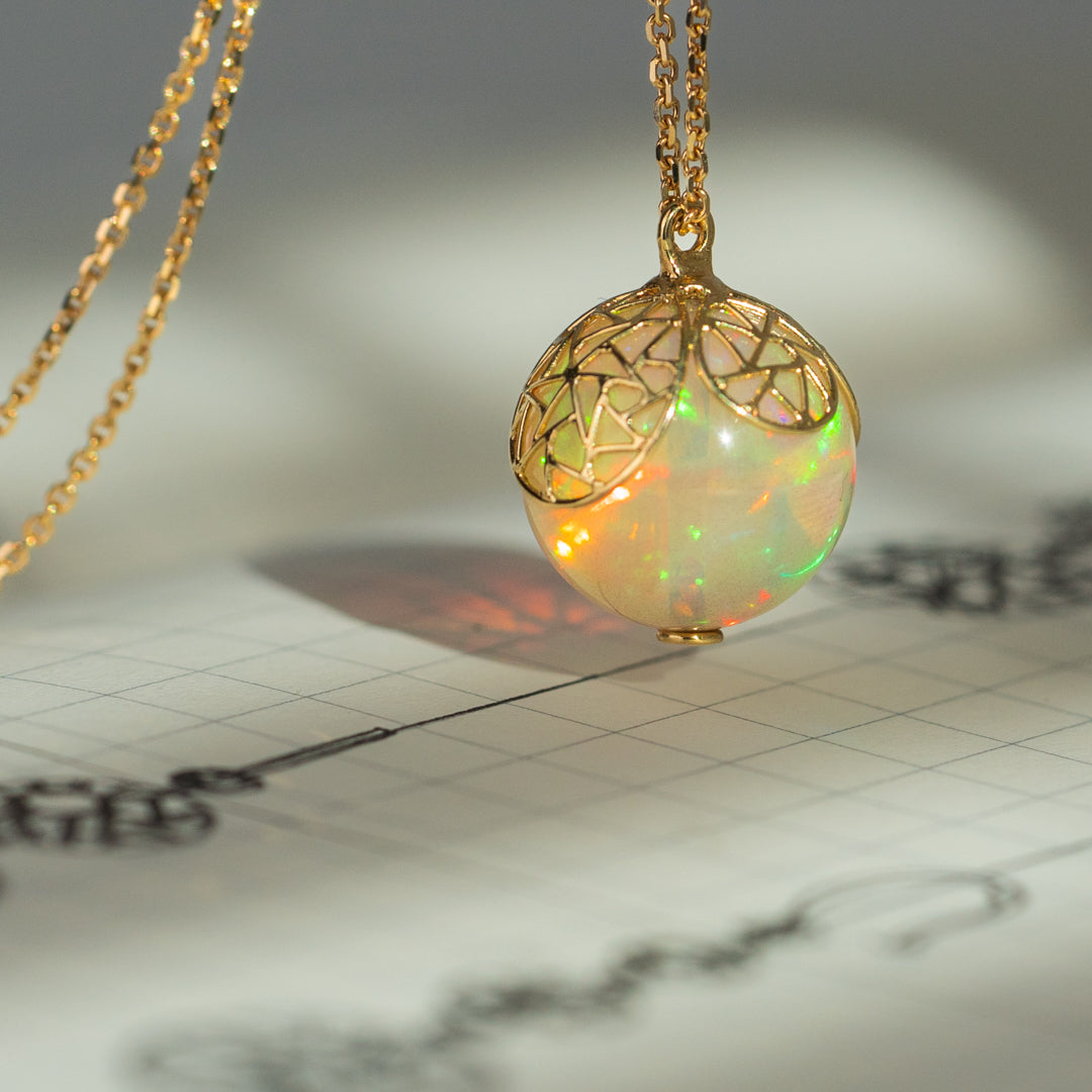 Round opal necklace with gold petals