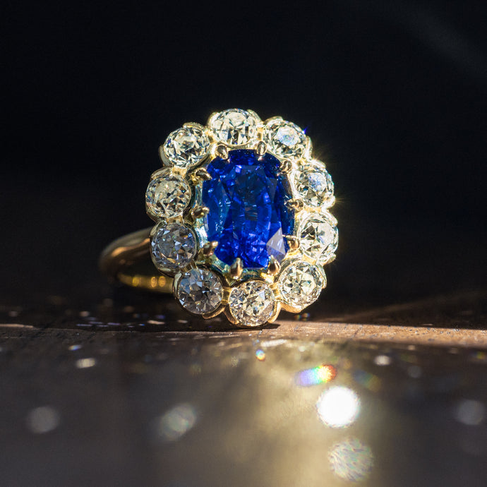 A Mother's Delight: Crafting a One-of-a-Kind Ring with a Cushion-Cut Sapphire and Old European-Cut Diamonds.